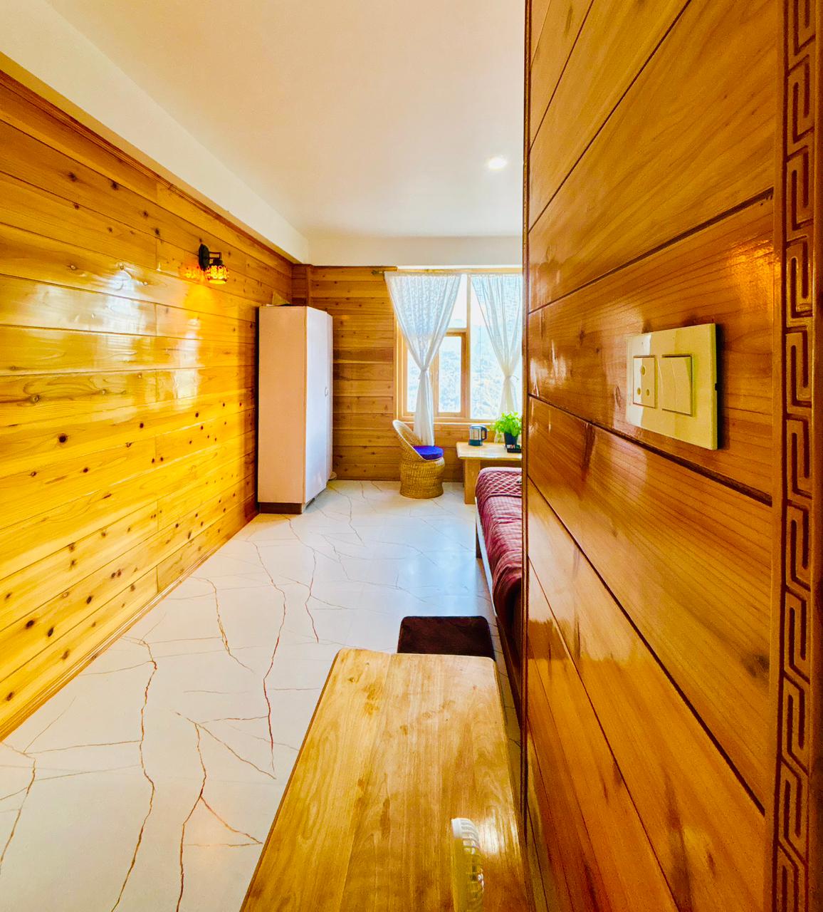 Entrance passage into the King Suite with wood-panelled walls