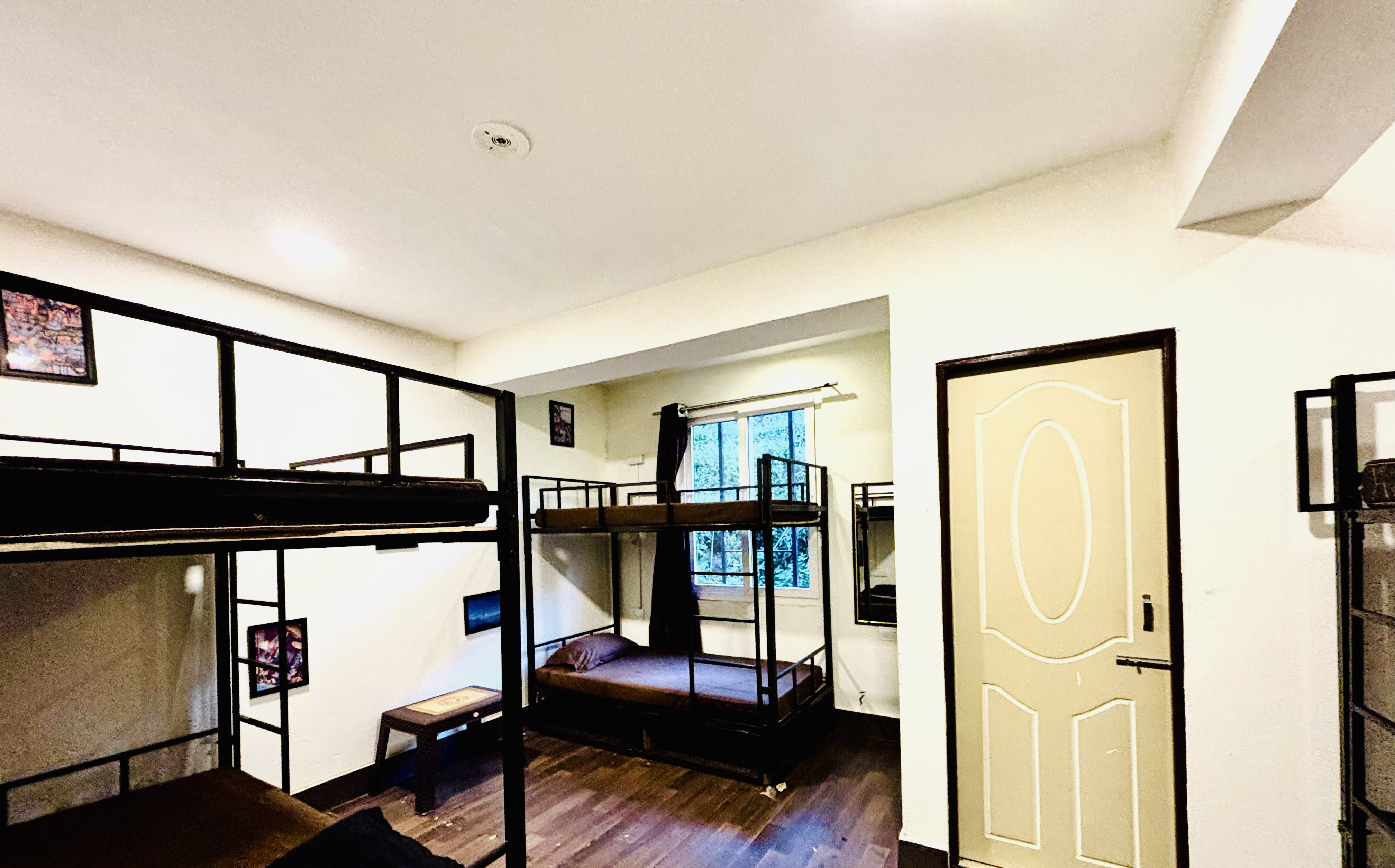Bunk bed room at Arosia by The Hive with timber bunks and mountain view